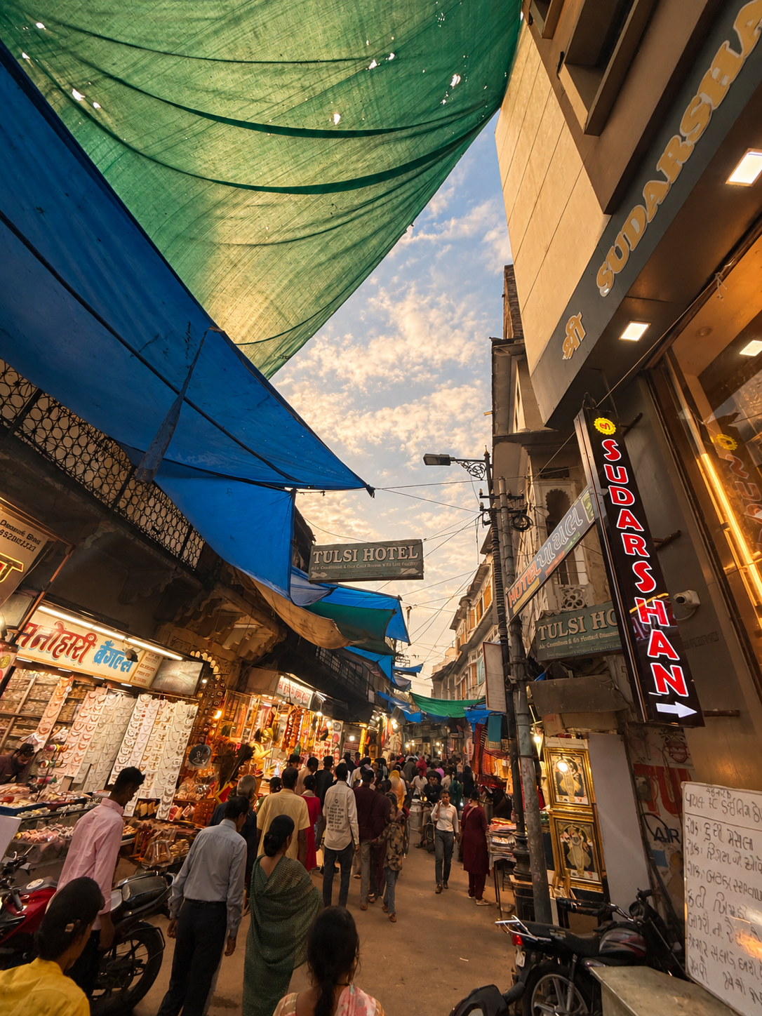 A market street under colourful shade cloths in Udaipur